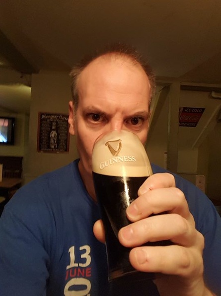 Downing my sorrows with a pint of black..jpg